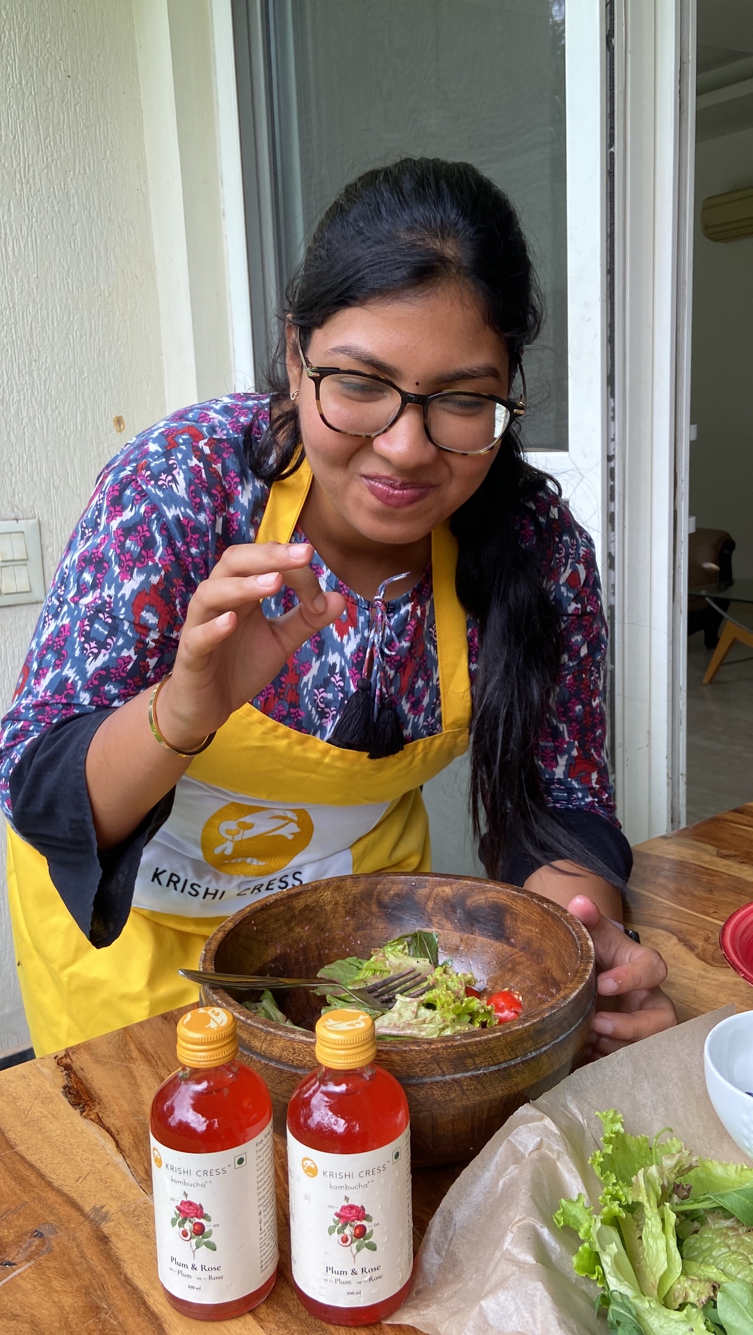 Chef tasting a salad with Krishi Cress kombucha
